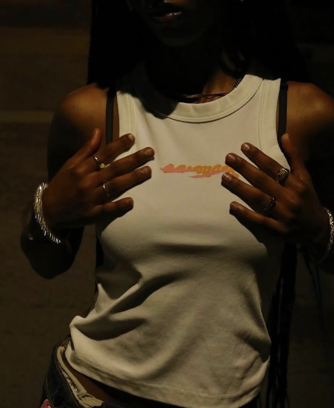 la*mar tank top photographed at night